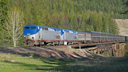 This image of the passenger train crossing the trestle was taken in NW Montana near Essex. This image of the passenger train crossing the trestle was taken in NW Montana near Essex.