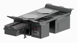 A 3D product rendering of an EnerSys transit battery enclosure on a white background. The large gray metal housing features two octagonal access panels on the top surface, a hinged drawer-style compartment at left revealing internal battery connections, and an EnerSys-branded front panel with a red safety disconnect switch. Mounting flanges are visible along the top edges. A 3D product rendering of an EnerSys transit battery enclosure on a white background. The large gray metal housing features two octagonal access panels on the top surface, a hinged drawer-style compartment at left revealing internal battery connections, and an EnerSys-branded front panel with a red safety disconnect switch. Mounting flanges are visible along the top edges.
