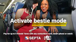 Two women sitting together on a commuter train laugh while one holds a smartphone and sunglasses. Large promotional text reads “Activate bestie mode,” with additional text advertising SEPTA contactless payment for up to five friends’ fares. Two women sitting together on a commuter train laugh while one holds a smartphone and sunglasses. Large promotional text reads “Activate bestie mode,” with additional text advertising SEPTA contactless payment for up to five friends’ fares.