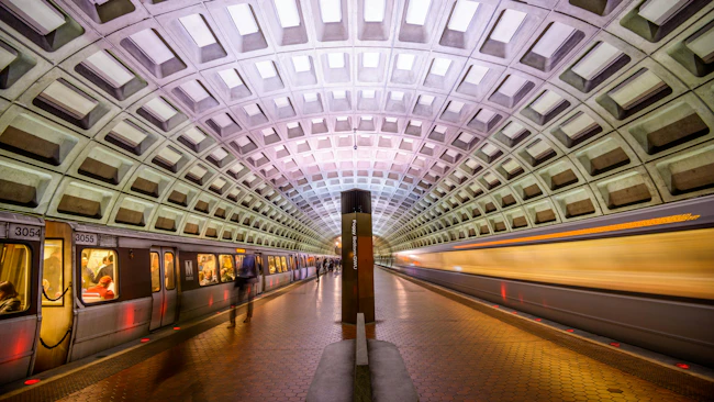 trains and passengers in a WMATA underground rail station