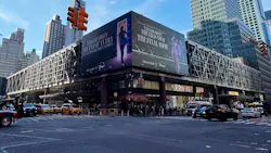 The exterior of the Port Authority Bus Terminal in Midtown Manhattan, viewed from street level at the intersection of Eighth Avenue and 42nd Street, with yellow taxis and pedestrians visible along the sidewalk. The exterior of the Port Authority Bus Terminal in Midtown Manhattan, viewed from street level at the intersection of Eighth Avenue and 42nd Street, with yellow taxis and pedestrians visible along the sidewalk.