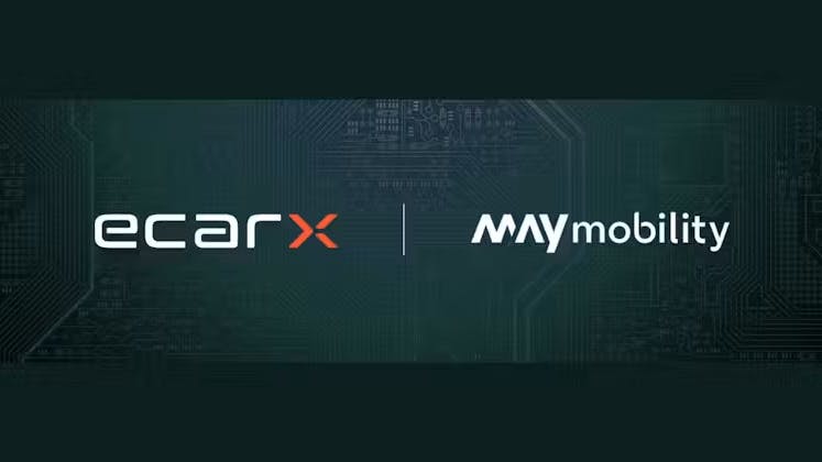 A dark teal partnership announcement graphic with a circuit board pattern in the background. The ECARX logo appears on the left in white with orange lettering, separated by a vertical dividing line from the May Mobility logo on the right in white.