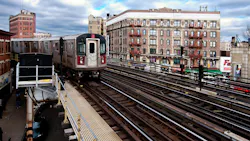 The MTA 5 Green subway line in New York City riding the rail tracks above ground in The Bronx. The MTA 5 Green subway line in New York City riding the rail tracks above ground in The Bronx.