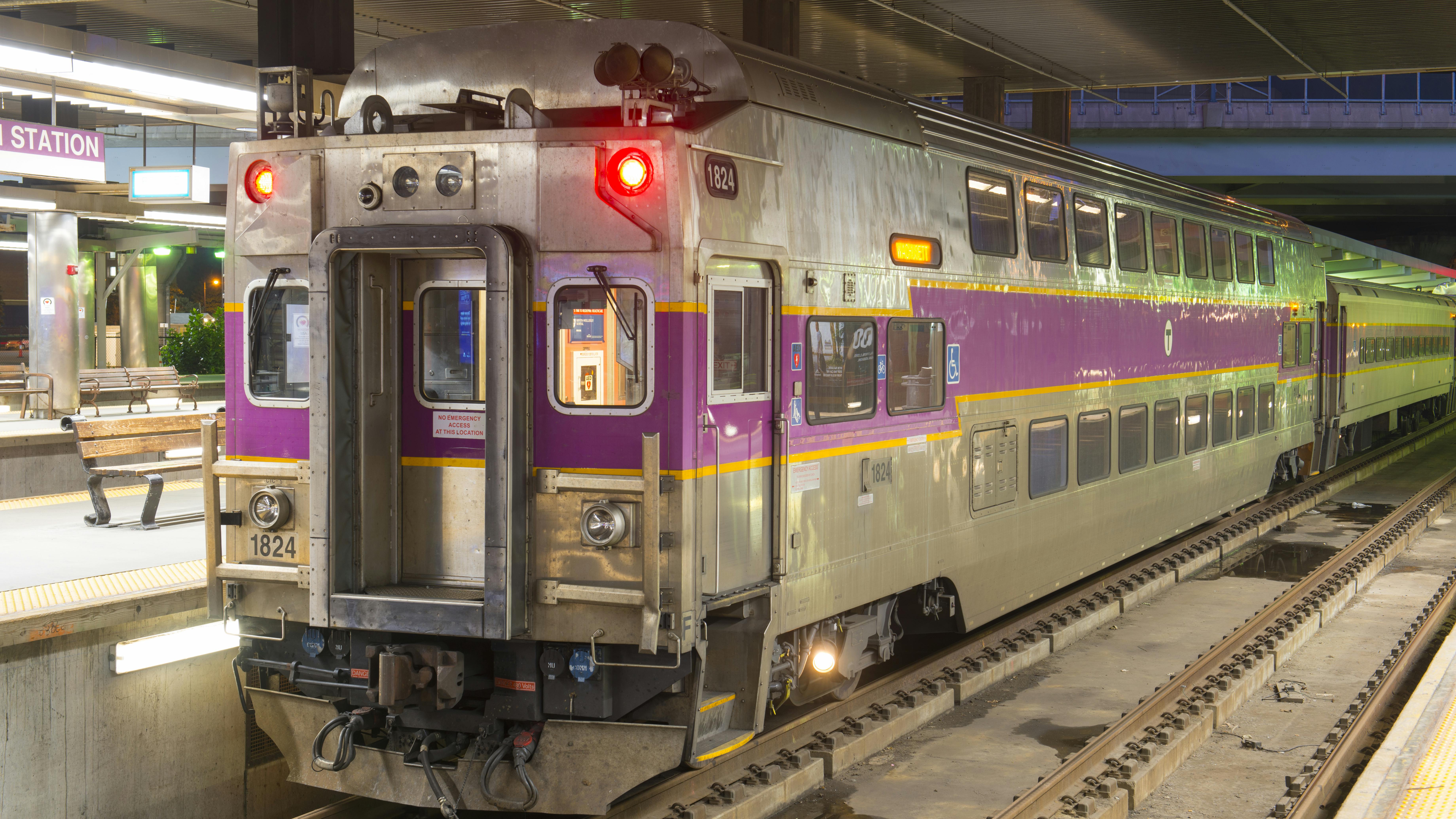 MBTA Commuter Rail bilevel cab car at night in North Station.