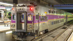MBTA Commuter Rail bilevel cab car at night in North Station. MBTA Commuter Rail bilevel cab car at night in North Station.