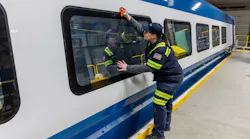 An Alstom employee working on an Amtrak Nextgen Acela train.