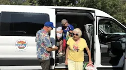 Senior citizens getting out of an Orange County Transportation Authority (OCTA) van as part of the OCTA Senior Mobility Program.