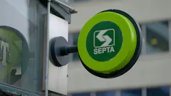 The SEPTA logo is displayed on a green circular sign. The SEPTA logo is displayed on a green circular sign.