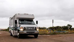 A transit van in a rural area.