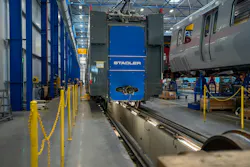 an aluminum car body waits for additional assembly