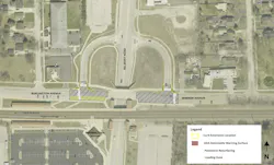 An aerial site plan map of the Belmont Train Station area in Illinois, showing proposed infrastructure improvements at the intersection of Belmont Road with Burlington Avenue and Warren Avenue. Overlaid design elements indicate curb extension locations in yellow, ADA detectable warning surfaces in red, pavement resurfacing in gray hatching, and loading zones, with directional labels noting train service toward Aurora and Chicago along the BNSF corridor below.