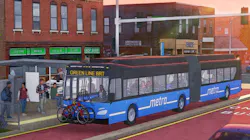 A rendering of a blue and black articulated Metro Transit bus rapid transit vehicle marked 'Green Line BRT' pulling up to a dedicated station platform in a red-painted bus-only lane, with pedestrians waiting to board and a row of storefronts along the streetscape at dusk.