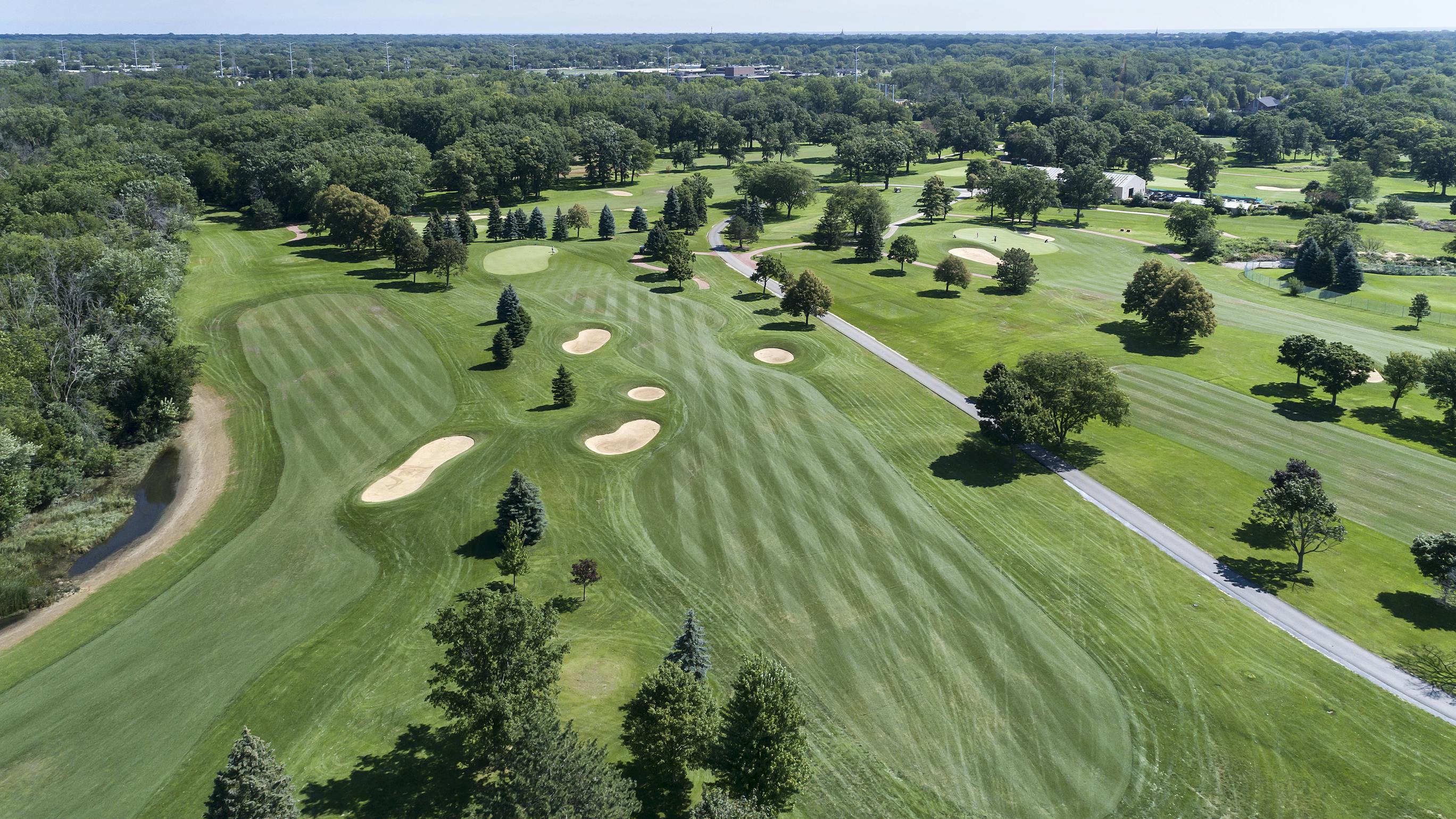 Aerial view of a suburban Chicago golf course with fairways and sand traps in Wilmette, Ill.