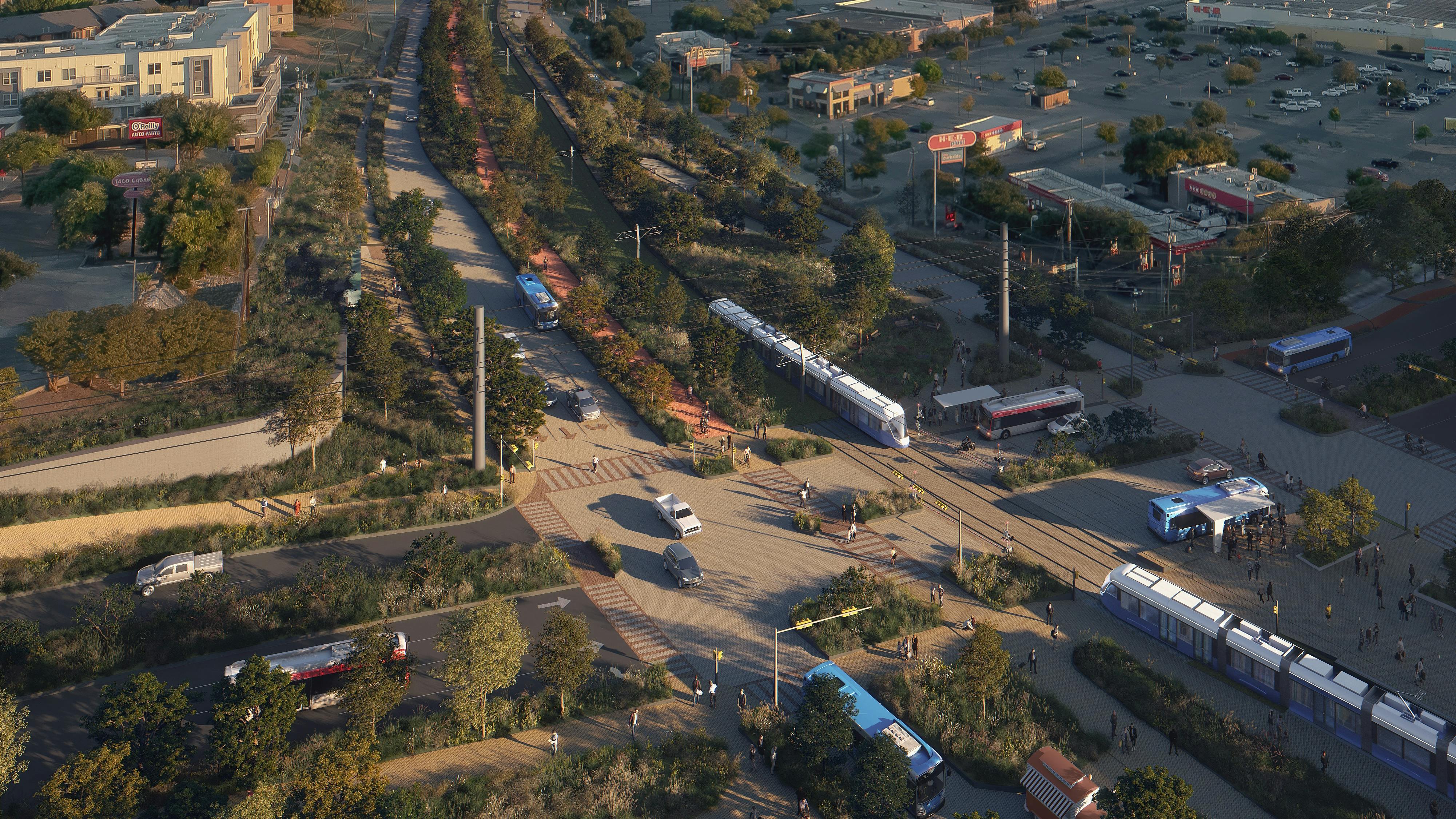 A rendering of Austin's future light rail line along Pleasant Valley Road, showing a modern white and blue light rail vehicle traveling alongside a landscaped multi-use path and roadway, with strip-mall retail and parking lots to the sides and the downtown Austin skyline in the distance at dusk.