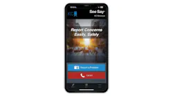 A smartphone mockup displaying the KC Streetcar's See Say safety reporting app, featuring the tagline 'Report Concerns Easily, Safely' and two call-to-action buttons — a blue 'Report a Problem' button and a red 'Call 911' button — powered by ELERTS Corp.