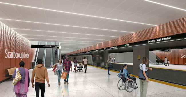 An initial concept rendering of the future Scarborough Center subway station platform on the TTC Scarborough Subway Extension, featuring warm terracotta-toned perforated wall panels, linear LED ceiling lighting, a yellow tactile platform edge, escalators, and diverse riders including a wheelchair user, with a subway train depicted passing through in motion blur.