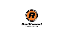 The Railhead Corporation logo, featuring a bold black 'R' centered within an orange circle and double black ring, above the company name 'Railhead Corporation' in black italic and spaced capital lettering