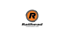 The Railhead Corporation logo, featuring a bold black 'R' centered within an orange circle and double black ring, above the company name 'Railhead Corporation' in black italic and spaced capital lettering
