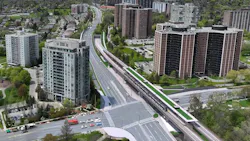An aerial rendering of the elevated guideway section of the Eglinton Crosstown West Extension in Toronto, Ontario, showing a light-rail transit structure running alongside a multi-lane arterial road through a residential neighborhood of mid-rise and high-rise apartment towers, with green landscaping along the guideway base and a station platform visible in the foreground.