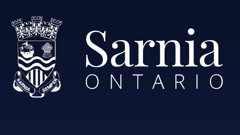 The City of Sarnia, Ontario logo, showing the municipal crest beside the wordmark 'Sarnia Ontario' in white on a dark navy background.