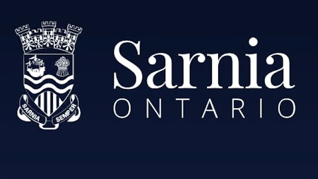 The City of Sarnia, Ontario logo, showing the municipal crest beside the wordmark 'Sarnia Ontario' in white on a dark navy background.