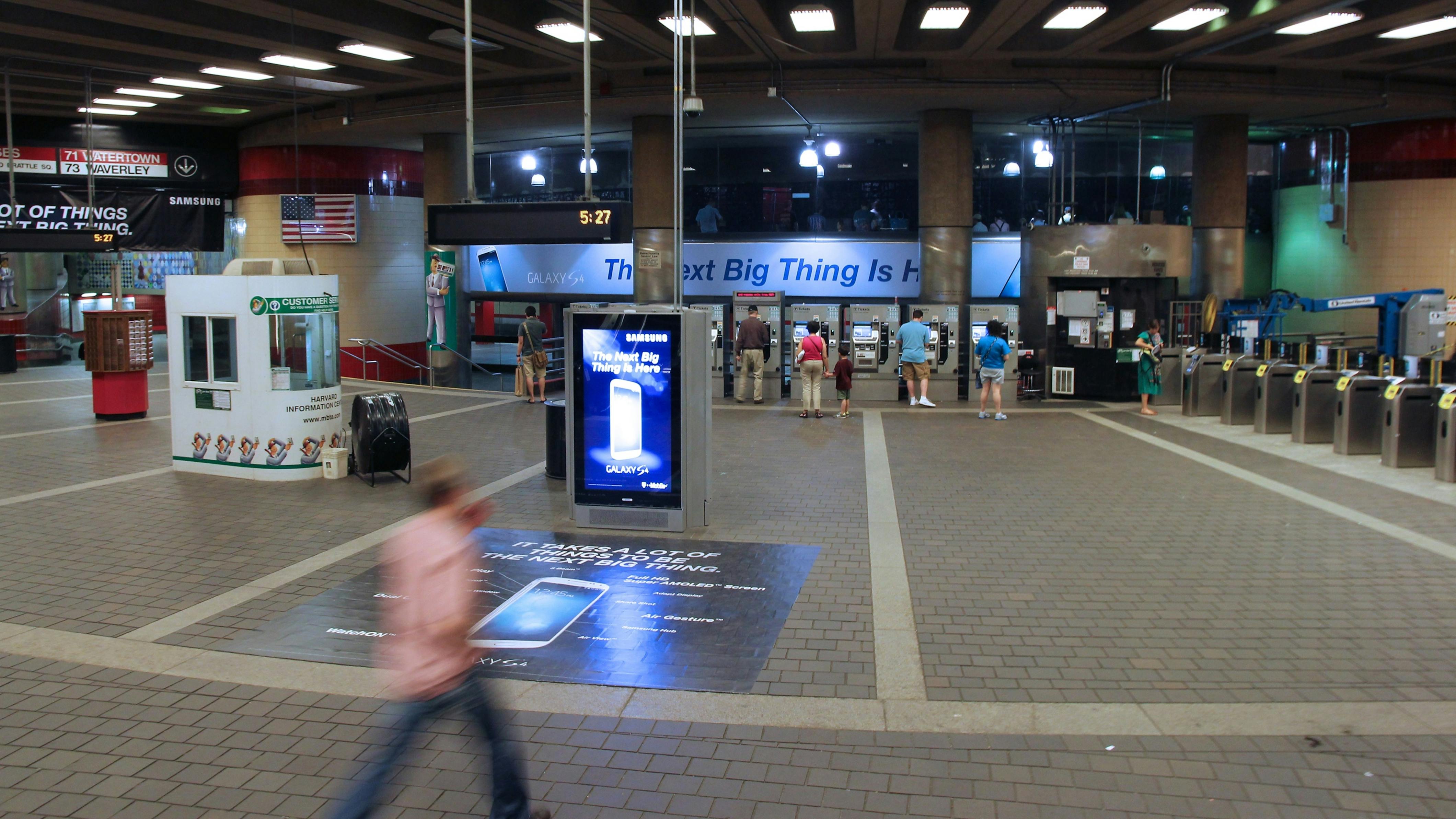 People enter MBTA subway station