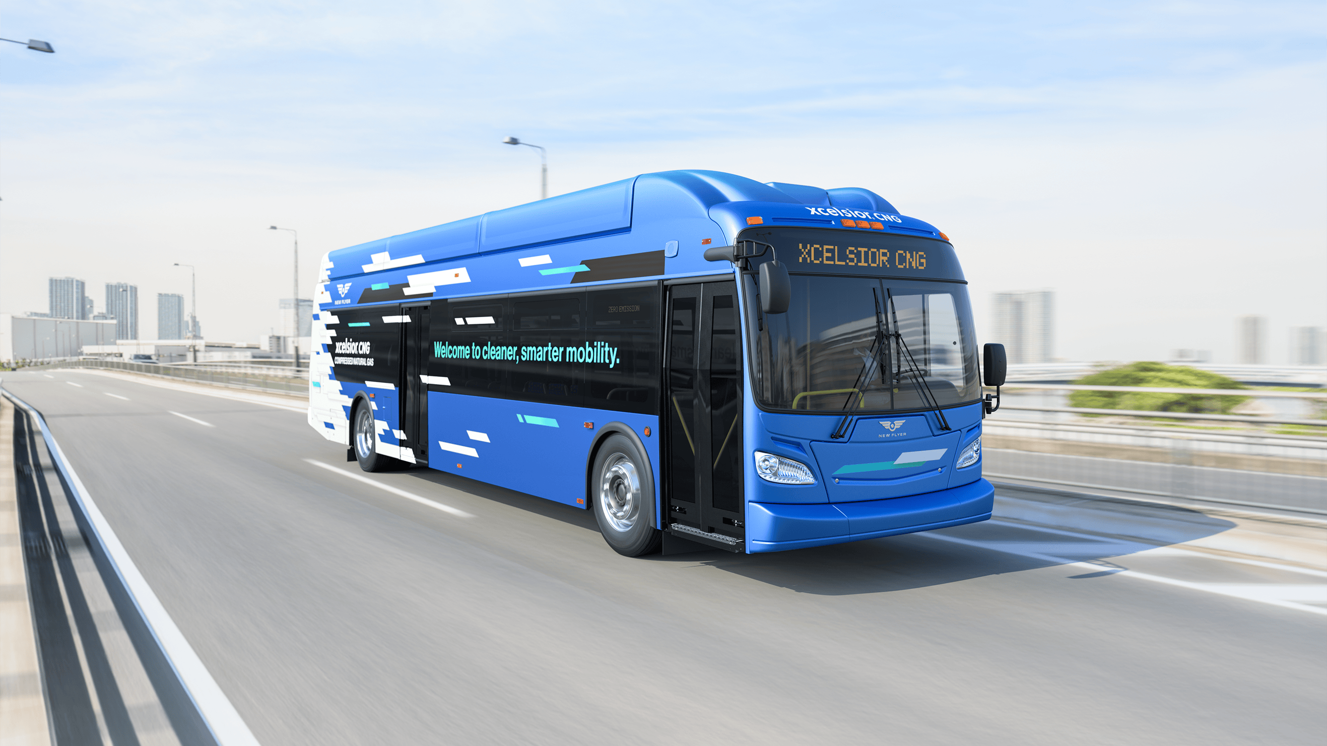 Rendering of a New Flyer Xcelsior CNG bus in blue and white livery, displaying 'Welcome to cleaner, smarter mobility' along its side, traveling on an elevated highway with a city skyline in the background.
