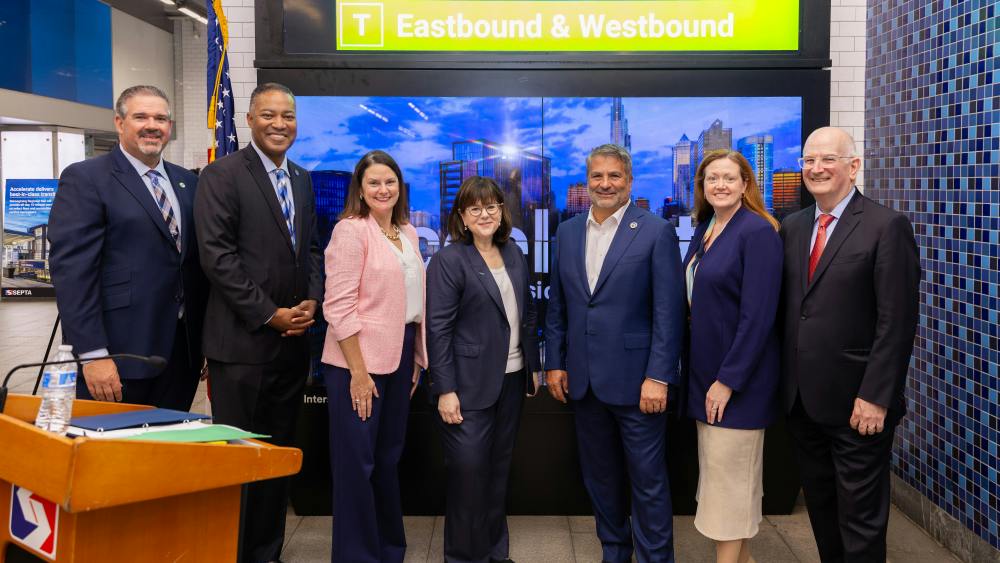 SEPTA officials and community leaders stand together at a subway station press conference announcing the Accelerate modernization plan.