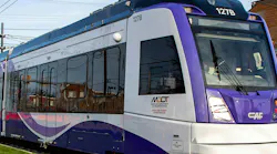 An up close shot of a a Purple Line LRV at Adelphi Road–UMGC–UMD station.