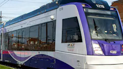 An up close shot of a a Purple Line LRV at Adelphi Road–UMGC–UMD station.