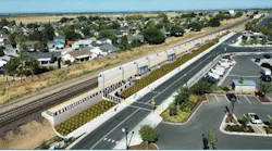 Rendering of a planned rail underpass, showing a sunken roadway beneath railroad tracks with landscaped retaining walls, near a parking lot and residential neighborhood.