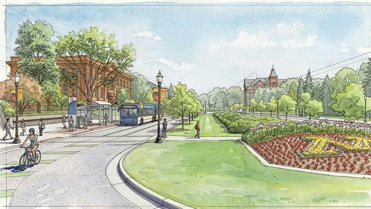 A watercolor-style rendering of a bus rapid transit corridor shows a blue articulated bus stopping at a covered station beside historic brick buildings, with a cyclist and pedestrians, a landscaped median, and a flower bed with a block &ldquo;M&rdquo; at right.